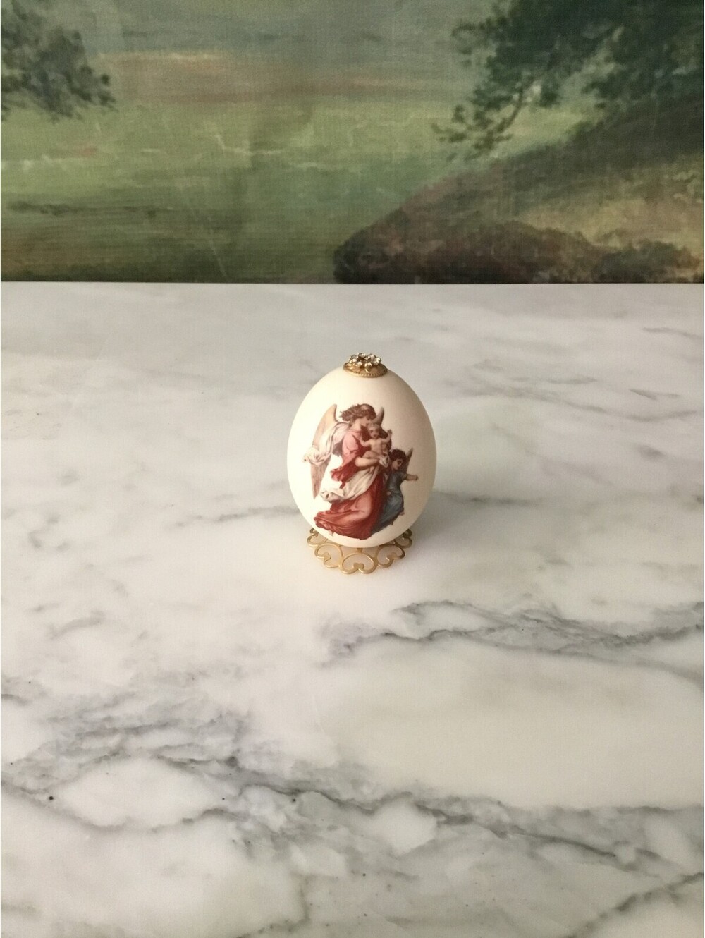 Ivory Decorative Egg with Cherub Artwork and Gold Tone Stand
